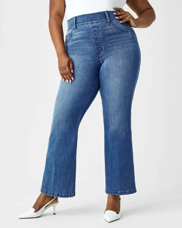 women's denim jeans with distressed hemsKick Flare Jeans In Vintage Indigo